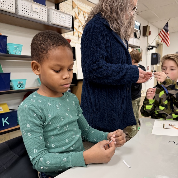 Students in STEM creating light up cards!