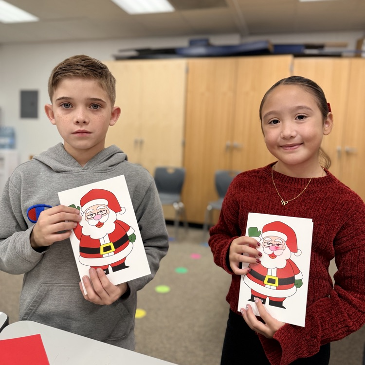 Students in STEM creating light up cards!