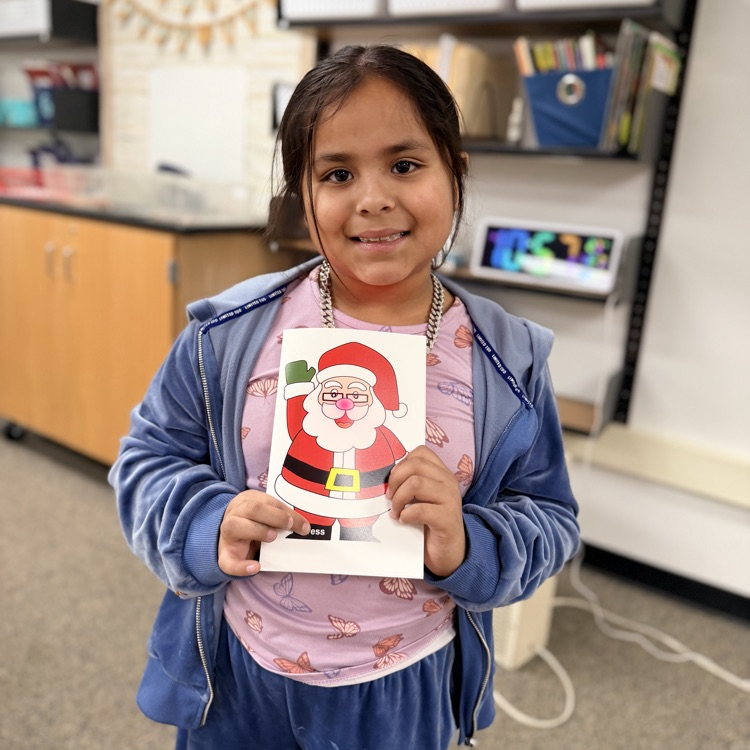 Students in STEM creating light up cards!