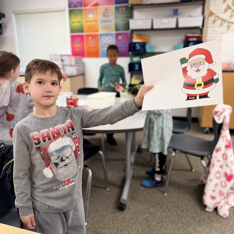 Students in STEM creating light up cards!