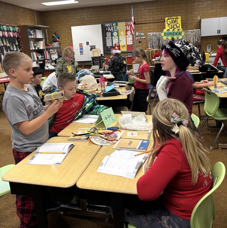 students working together to create an invention 