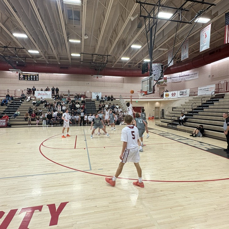Northridge basketball shooting a layup
