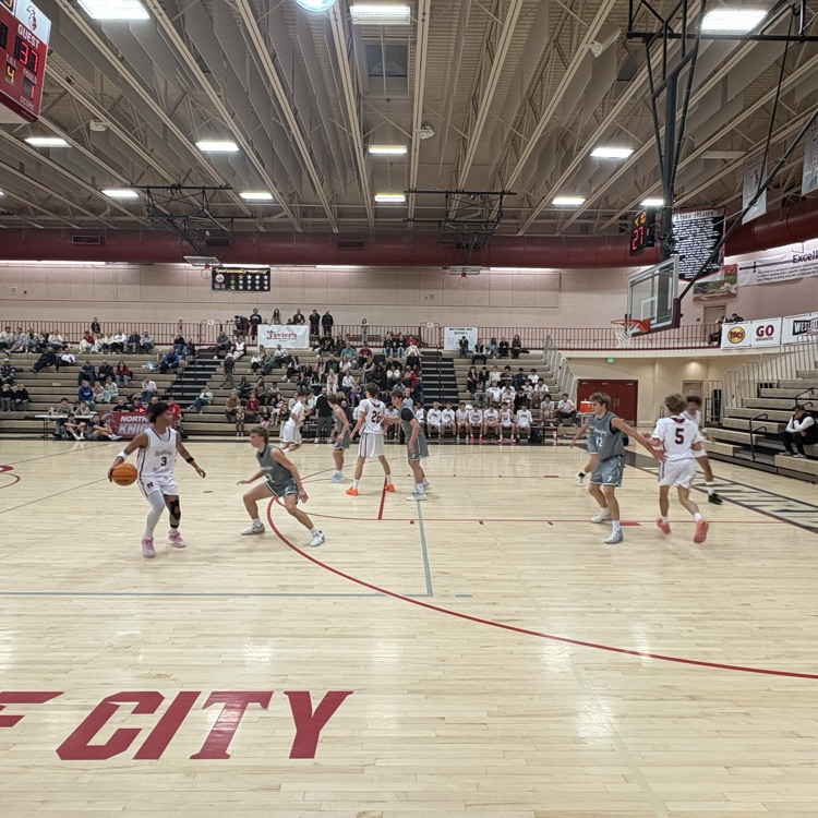 Northridge basketball setting up the offense