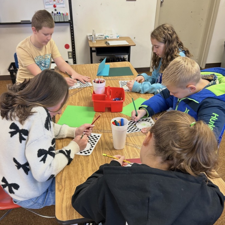 6ths graders working on an art project 