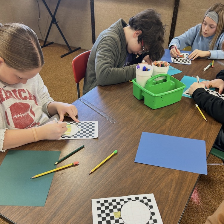 6ths graders working on an art project 