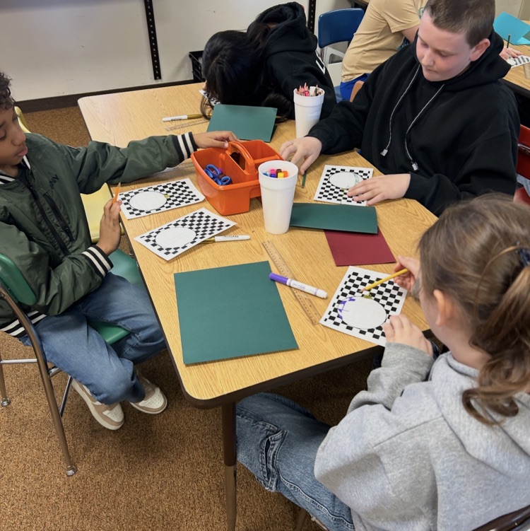 6ths graders working on an art project 