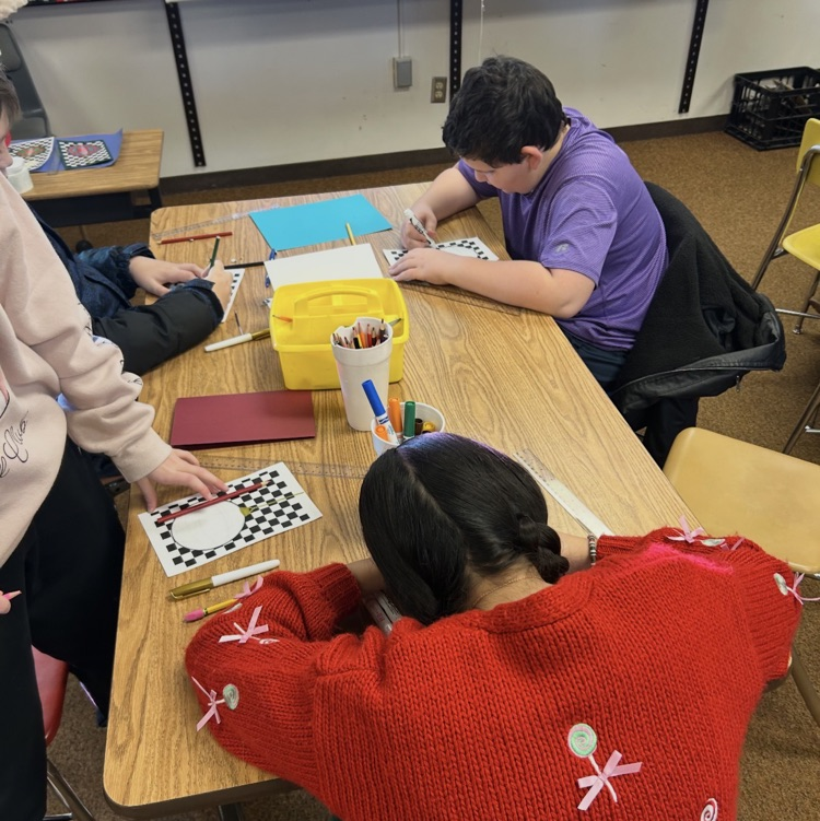 6ths graders working on an art project 