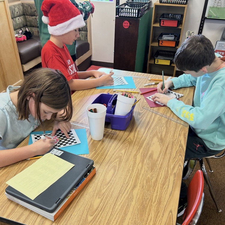 6ths graders working on an art project 