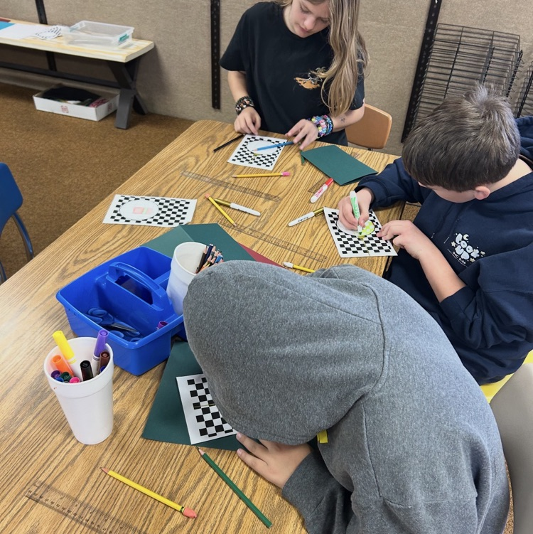 6ths graders working on an art project 