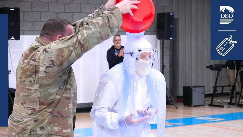 Principal Sims from Horizon Junior High gets slimed for first annual Duck the Halls fundraiser