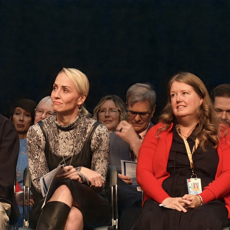 listening to the speaker