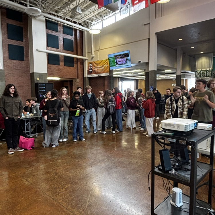 Students participating in a Karaoke party in the commons at lunch today