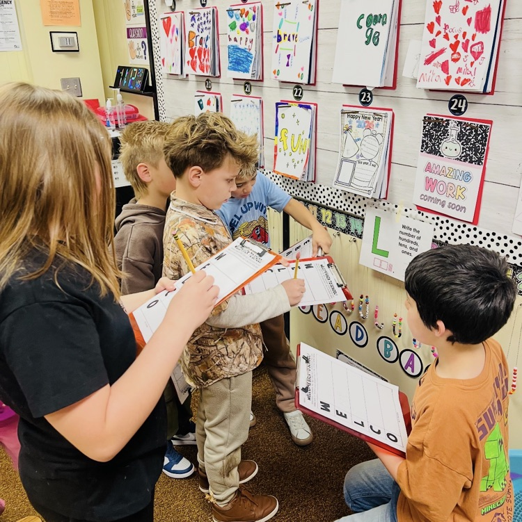 students solving math problems during an activity