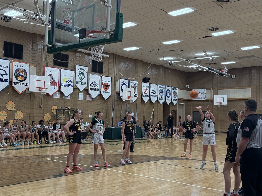 Girl shooting a free throw. 