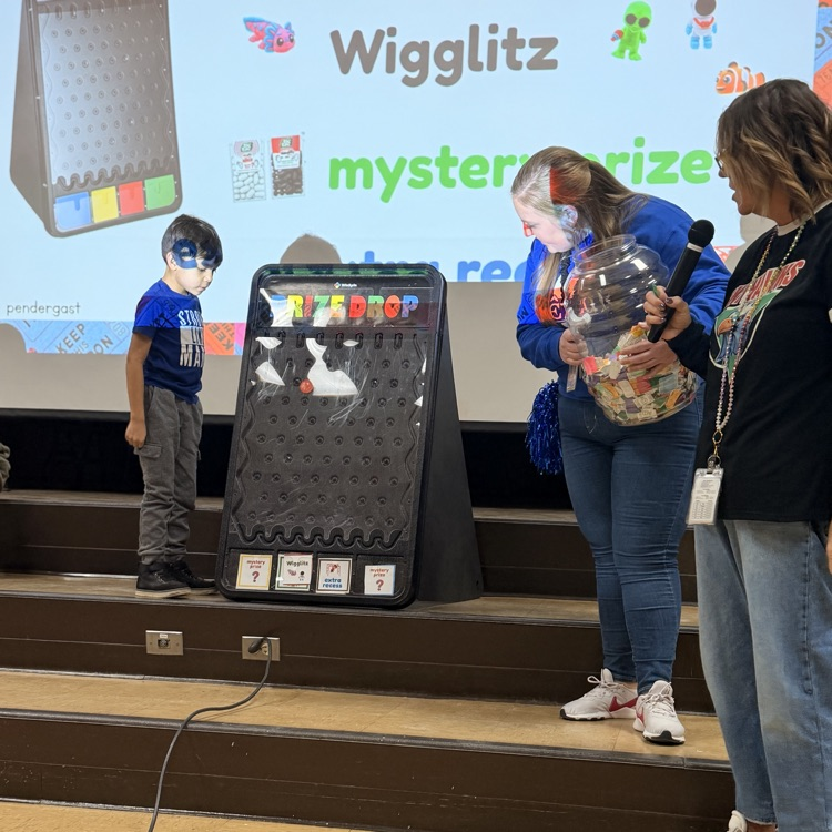 Student playing Plinko 