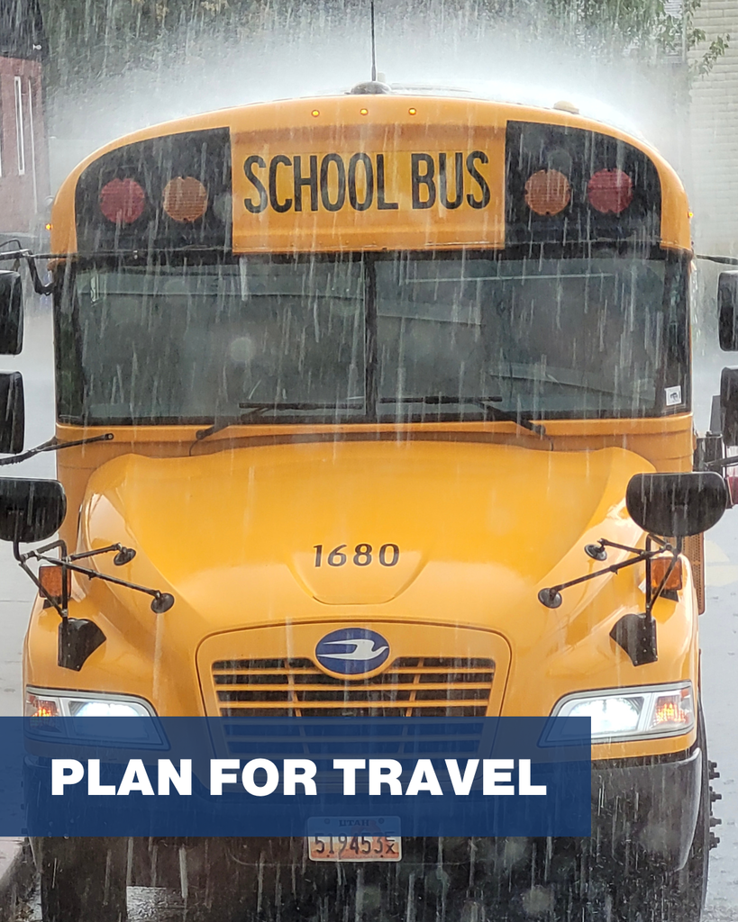 A school bus in the rain with the words "plan for travel."