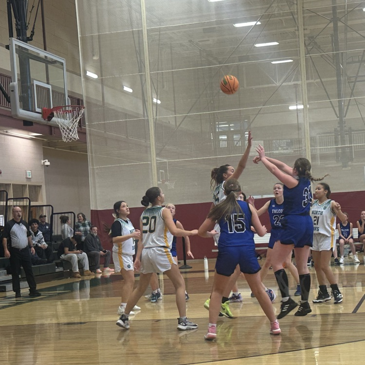 student shooting the ball