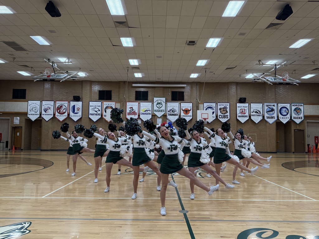 Cheer performing their Pom routines. 