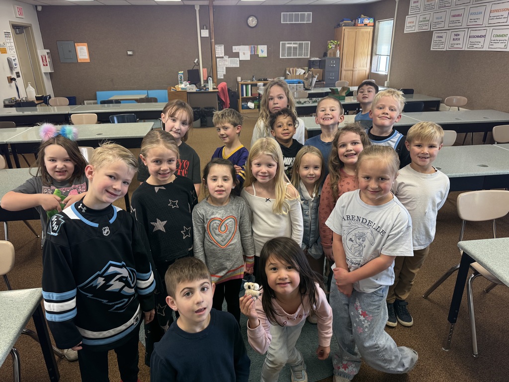 students showing off their kindness koala