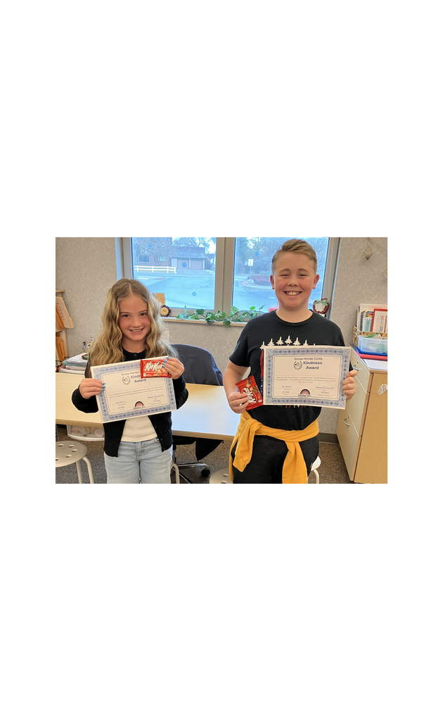 Boy and Girl holding certificates
