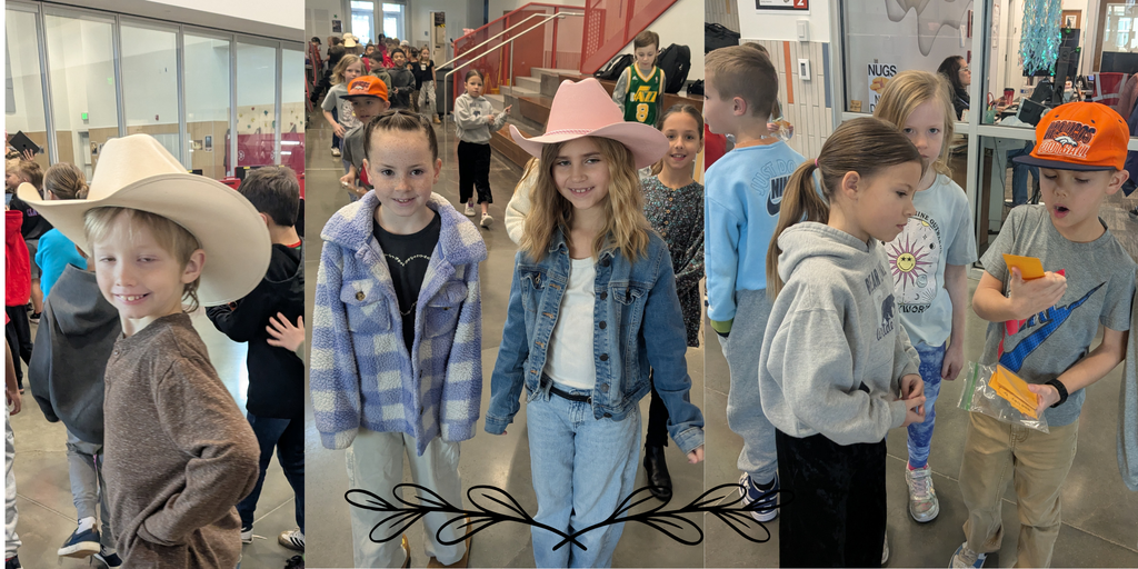 Students in cowboy attire posing for a picture. 
