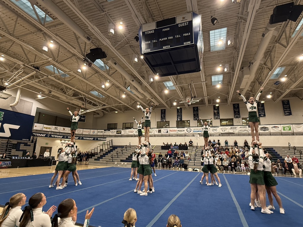 Cheerleaders in another stunt. 