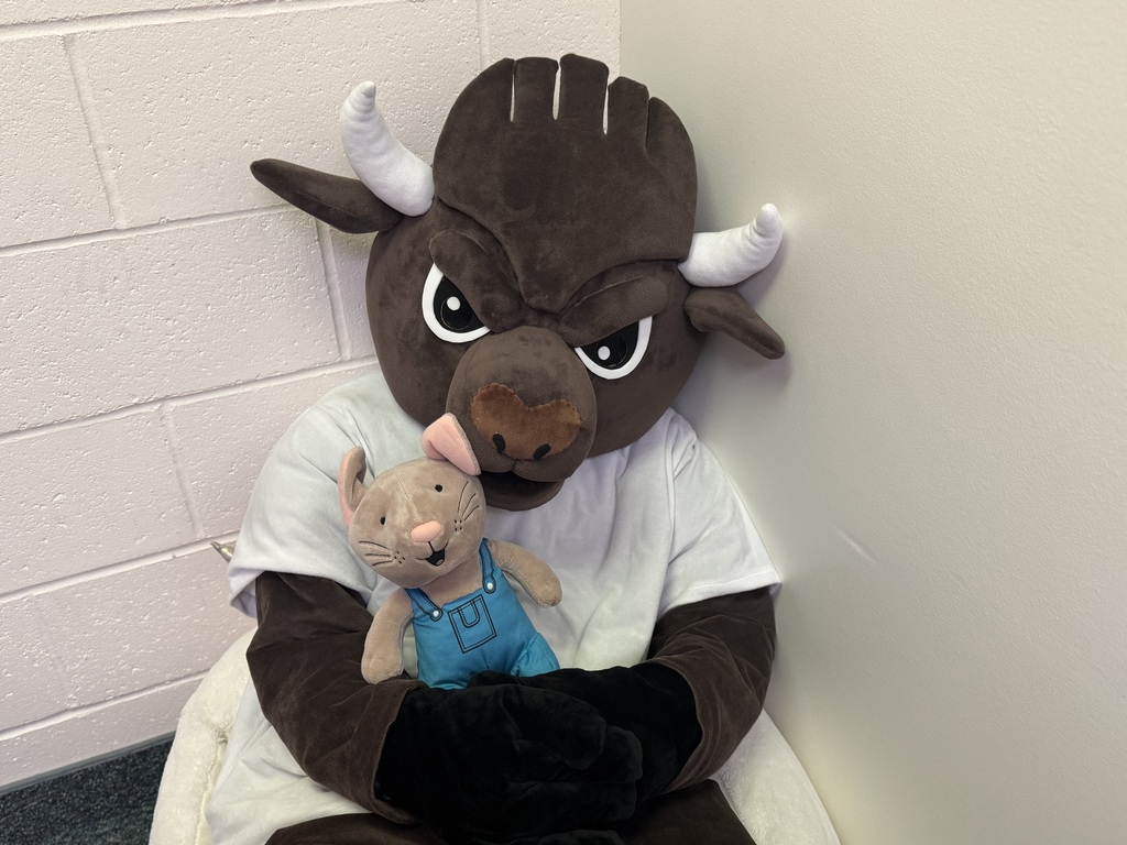 chip the buffalo with a stuffed mouse