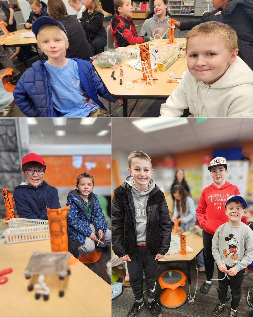 Pairs and small groups of 6th grade buddies posing with kindergarten students beside their paper tower projects during buddy time in the classroom.