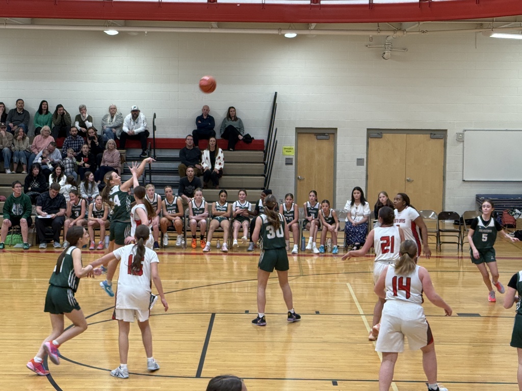 Girl shooting a 3-pointer. 