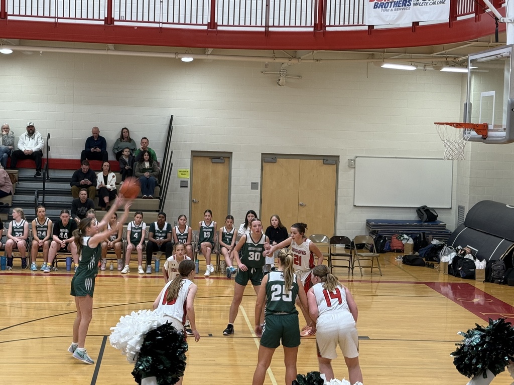 Girl shooting a free throw. 
