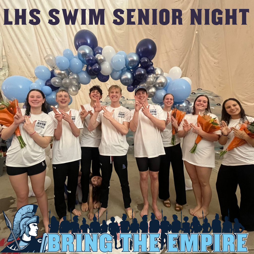 senior swimmers posing with their senior gifts doing the double L with their hands