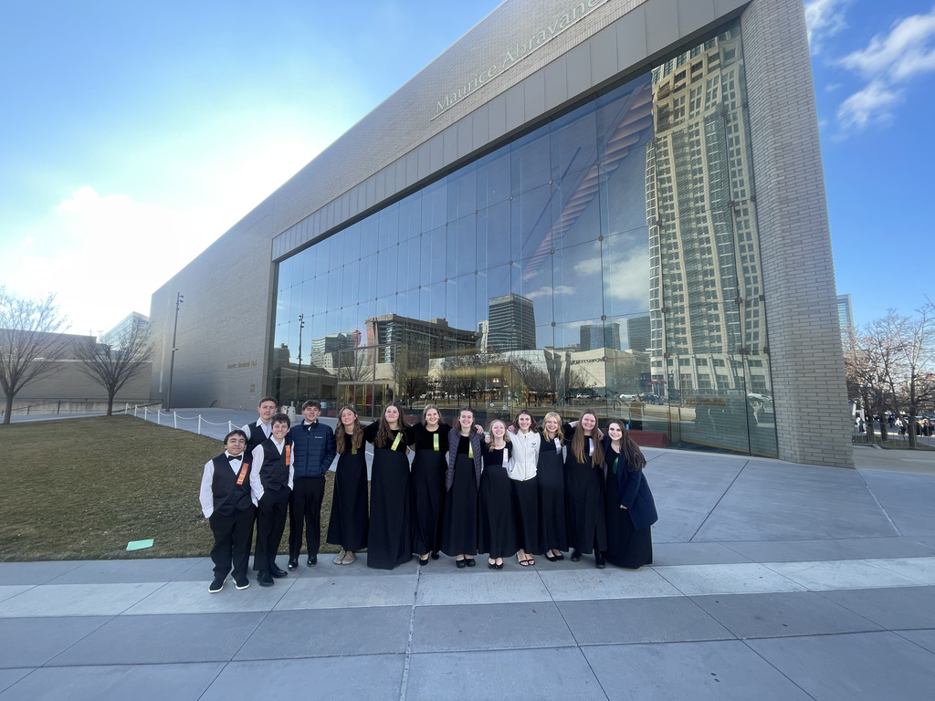 All State Choir students and teacher in front of Abravanel Hall.