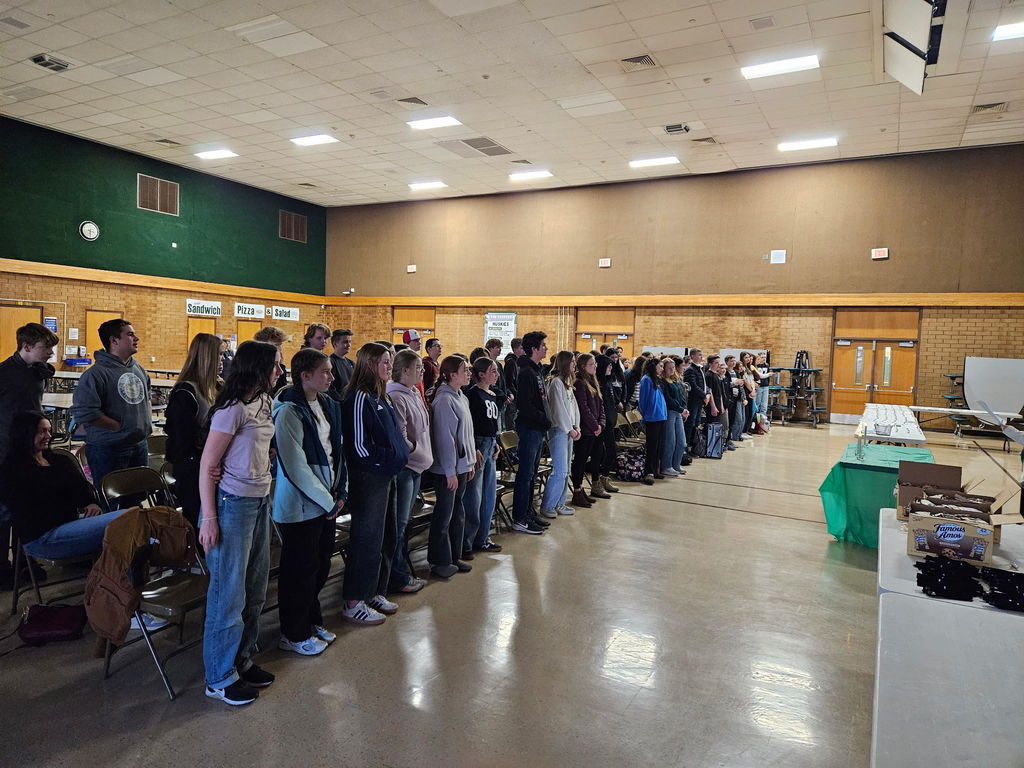 Students taking National Honor Society oath. 