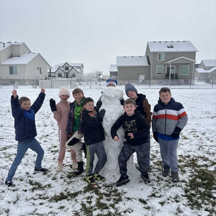 kids playing in the snow at recess