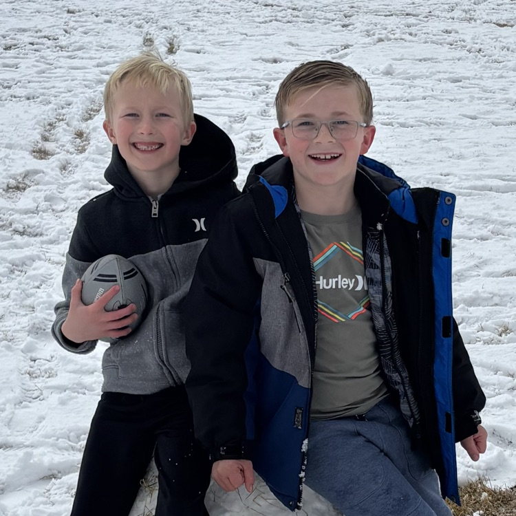 kids playing in the snow at recess