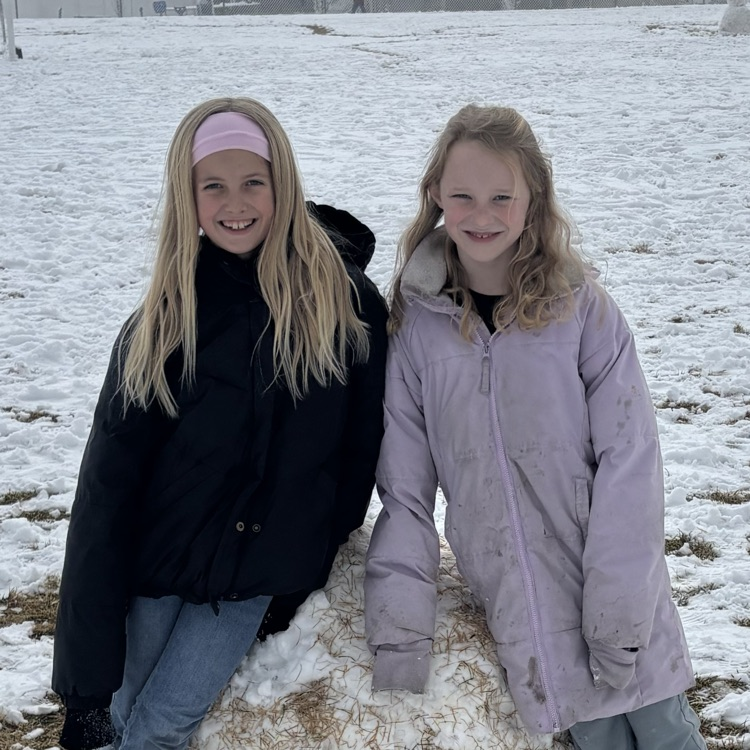 kids playing in the snow at recess