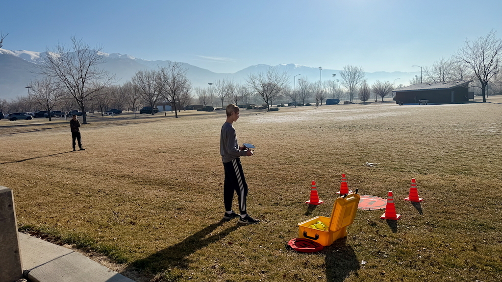 UAS Drones pilots fly on a crisp January morning with their instructor, Brian Clancy.