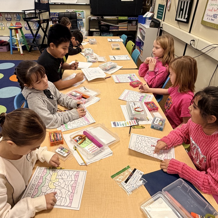 students working on math facts during the 100th day of school
