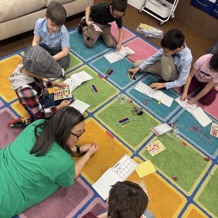 students using stickers to make tens frames