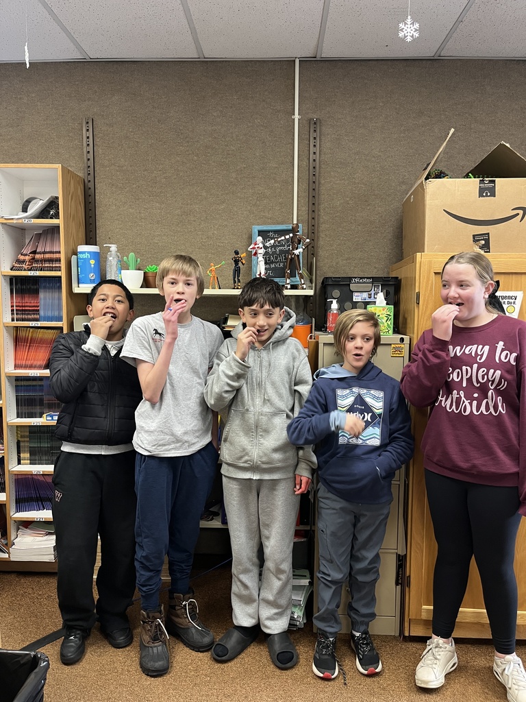 Sixth grade students trying out 90% dark chocolate. They were not fans of it.