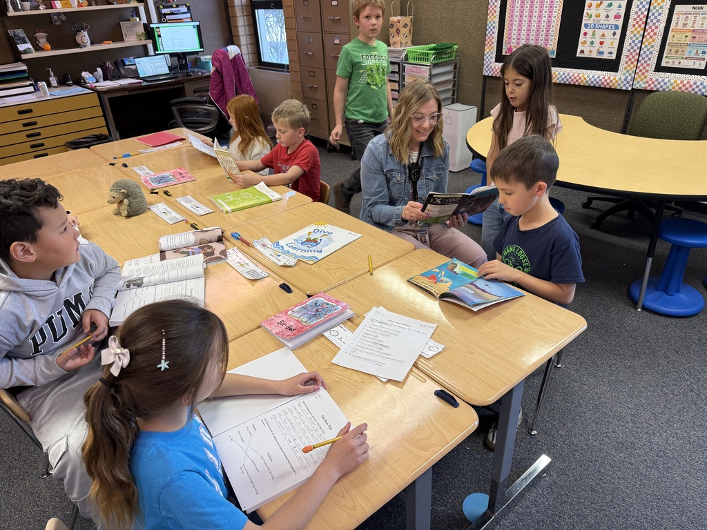 Mrs. Patt reading with her second grade students