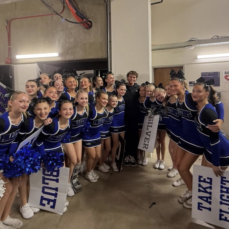 FFJH cheerleaders posing before performance