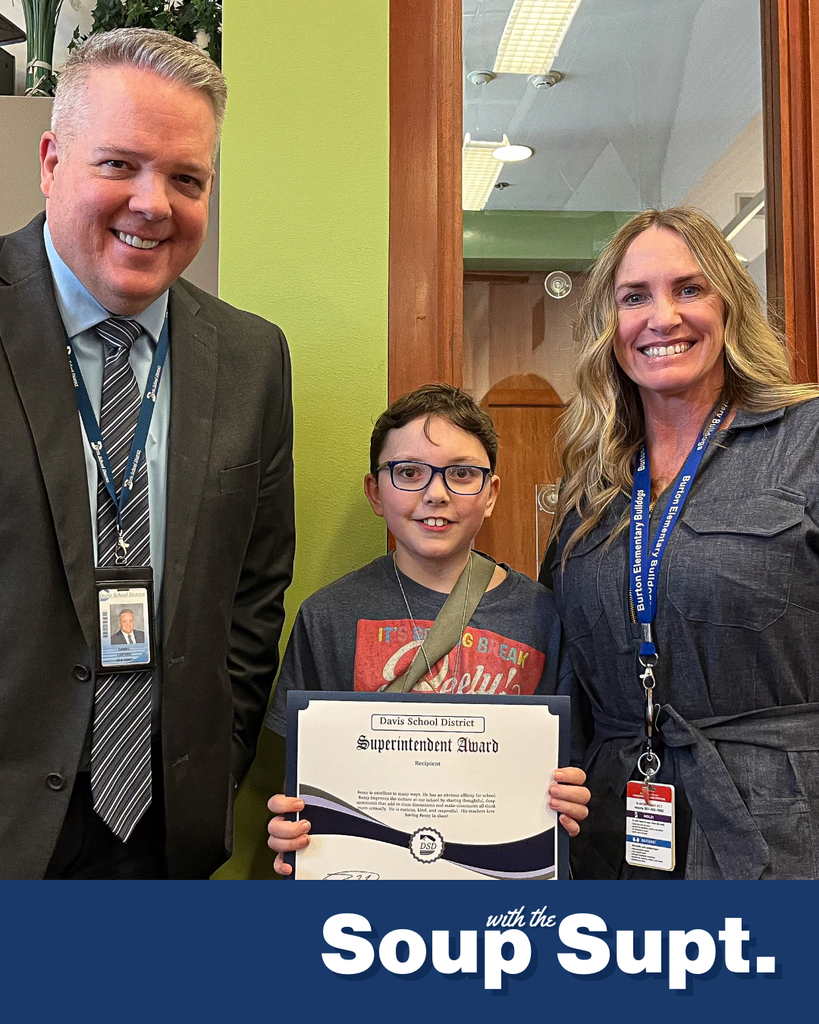 A student smiling with their principal and Dr. Linford, Davis School District Superintendent. 