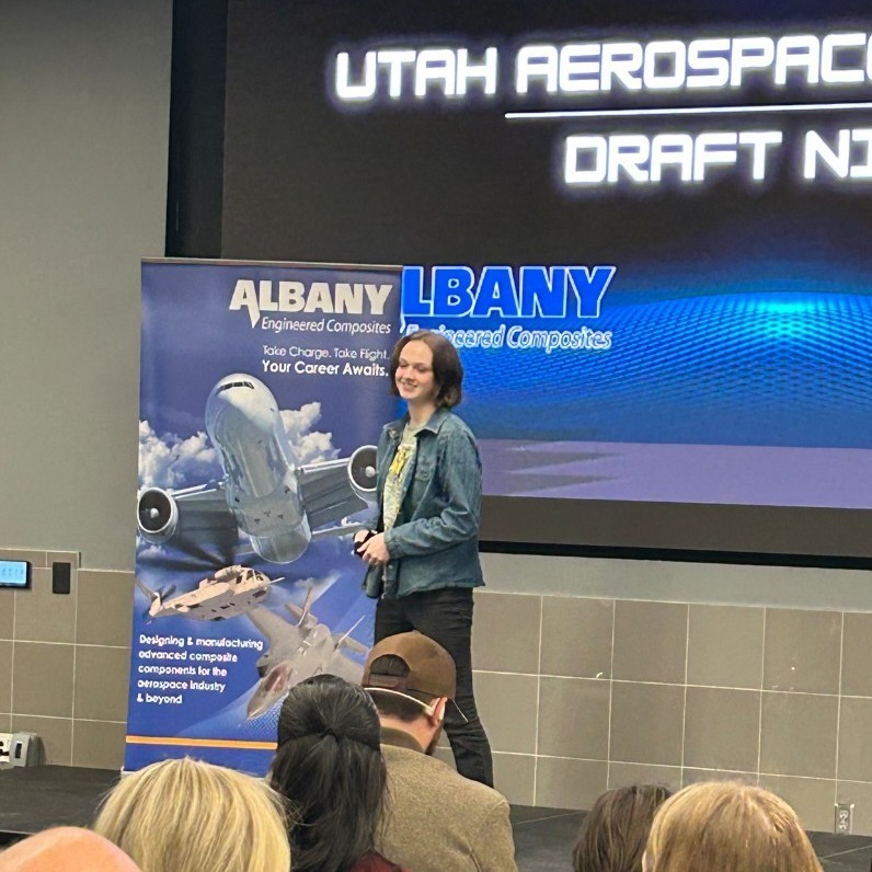 Lily standing up front at draft night