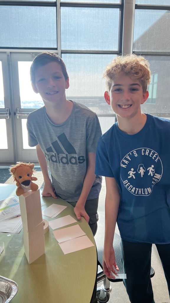 Students pictured working on STEM projects.