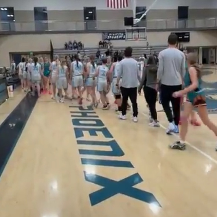 girls basketball winning semifinals