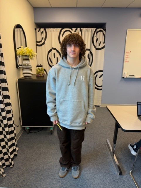 a picture of Cameron Bender who just finished his high school diploma