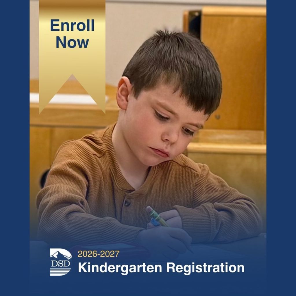 Student writing with a pencil on a flyer that says Enroll Now. 2026-2027 Kindergarten Registration.