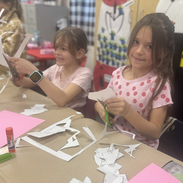 students cutting in activity