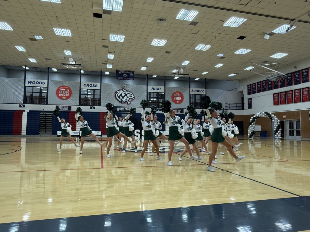 Cheerleaders opening performance of their Pom routine.